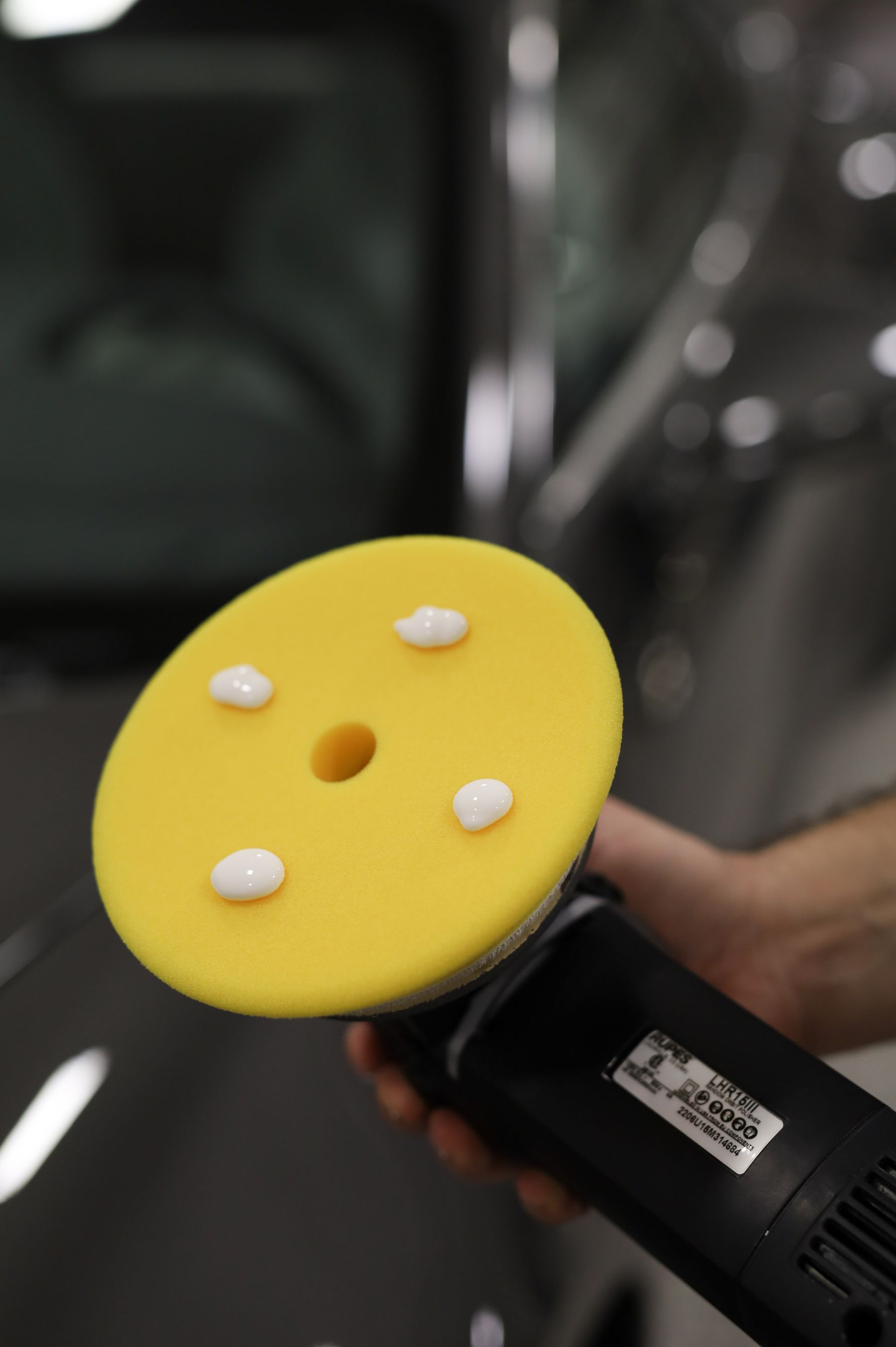 A polishing pad prepared for vehicle surface care